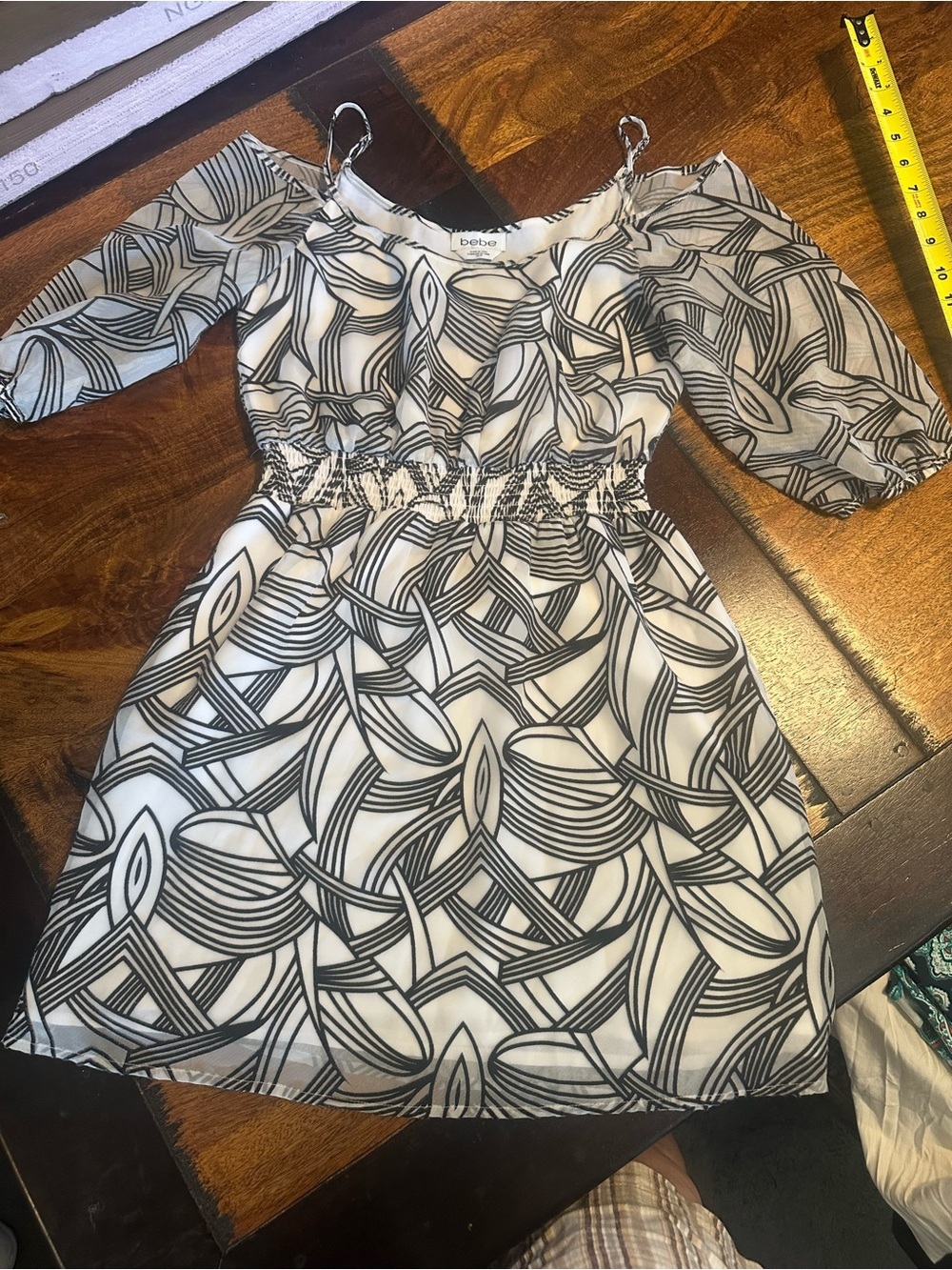 Bebe cute little dress size XS as new condition.